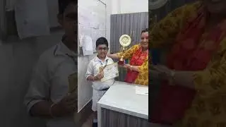 National Rank holder Agniv Kundu a receiving the award from Principal, St Augustine's Day School