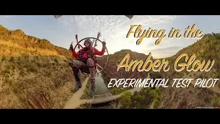 Experimental Test Pilot Flying in the Amber Glow Sunrise