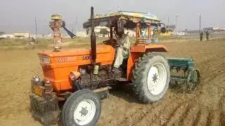 Drilling of wheat tractor wheat drill pothohar Islamabad gandum ki kasht