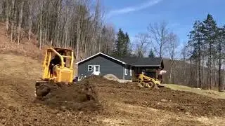 First of the year with the Dressta TD7 Dozer in the 236B CAT skid steer