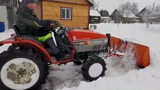 Уборка снега минитрактором Yanmar F-180
