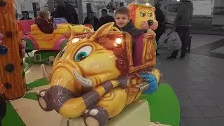 Indoor playground for kids with funny carousel.  Video from KIDS TOYS CHANNEL