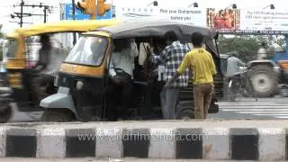 Passengers take lift from auto-rickshaw: Faridabad, Haryana