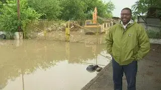 Heavy rain leads to delays and flooding across Dallas