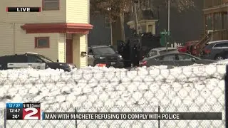 Man with machete in Utica