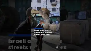 Israeli army blocks streets with concrete barriers in West Bank raid