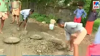 Natives protest by repair damaged road at Thripunithura
