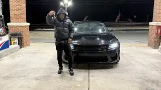 Taking delivery of a dodge charger widebody scat pack