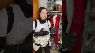 My biker scout costume gets protective of her helmet in the costume closet