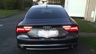 Audi A7 retrofitted facelift tail lights with dynamic indicators