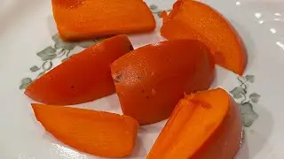 Growing Fuyu Persimmon in Arizona and harvesting of the first fruits.