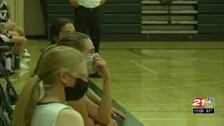Despite updated COVID restrictions, H.S. basketball tips off with masks