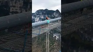 The world's tallest bridge under construction above the Huajiang Grand Canyon in Guizhou. #guizhou