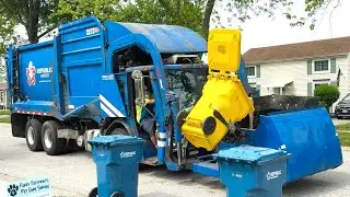 Republic Services Mack LEU Curotto Can Garbage Truck on Yellow Recycle Carts