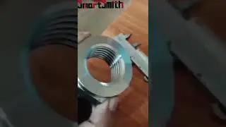 Automatic tapping of forged large nuts