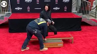 WEB EXTRA: Keanu Reeves Keeps Redoing Signature