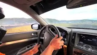 inside the car at a drift event with Emerson Jarvie
