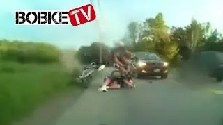 Cyclist hits Pothole and Crashes Horribly in Front of Car!