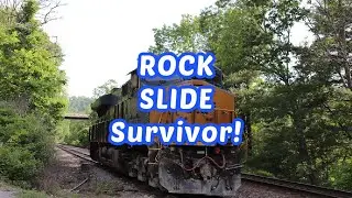 CSX Q694 with Rock Slide Survivor 3341 leading.