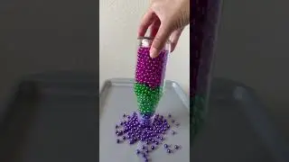 Pouring beads #satisfying #pearlhunter #pearlaccessories #beads #stonebeads