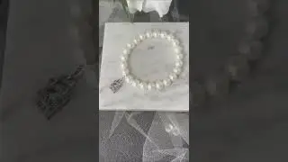 Pearl Bracelet's Secret: Unveiling the Smooth Operator's Charm!