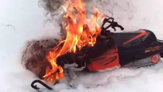 snowmobile on fire