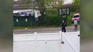 Staten Island police officers plays basketball with teen in Mariners Harbor