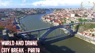 City break : Portugal : Porto - The Ribeira distric Dom Luis I Bridge on the Douro River from drone