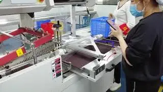 Automatic hand sanitizer bottle shrink wrapping machine