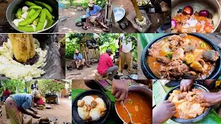 African Women Cooking for the Family with the help of their FATHER , Village Life