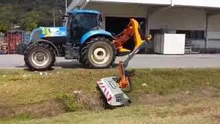 Noremat Reach Mower on New Holland tractor