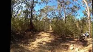 Husky 510 hitting jump on fire trail