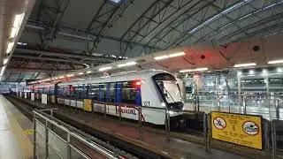 LRT Kelana Jaya Line Alstom Innovia Metro 300 TR21 departing at KL Sentral.