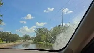 driving through flooded road after hurricane Milton