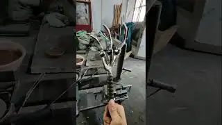 65cm steel eagle claw, made of rebar, quenched and blued.