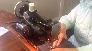 Singer Sewing machine with knee control.
