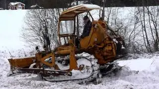 CAT D4 moving snow