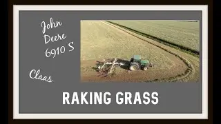 John Deere 6910s raking grass Claas rake