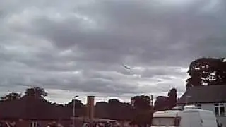 Lancaster Bomber low flying over Bletchley Park