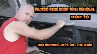 Pajero removing rear door trim and running wire to wheel carrier