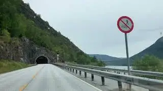 Driving Norway &ndash; roads along fjords next to mountains with nice views and tunnels, tunnels, tunnels