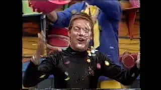 Richard McCourt gets messy playing Buzzy Business on CBBC