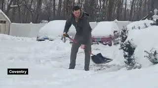 Snowed-in Connecticut digs its way out from winter storm