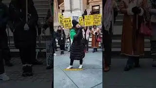 Chicana protests against Donald Trump, JD Vance and ICE.