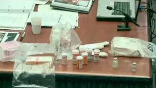 Investigator describes drugs, urine jar