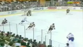 Ray Bourque destroys Jeff Parker 1/7/90