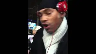 Delie Red X outside of Club One in London