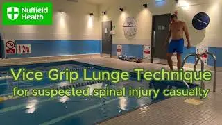 Vice Grip Lunge technique for a suspected spinal injury casualty in shallow water