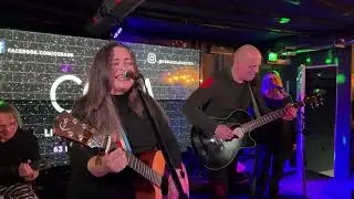 First it giveth -our cover by Queens of the Stone Age, featuring special guests 