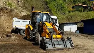JCB Dozer Loading Sandy Mud into Truck | Heavy Equipment in Action